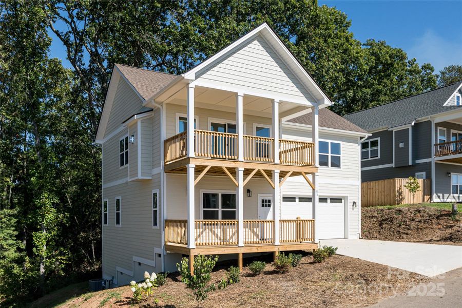 Front exterior of a new home in , Asheville, NC, highlighting curb appeal (Image 24). Front exterior of a new home in , Asheville, NC, highlighting curb appeal (Image 24).