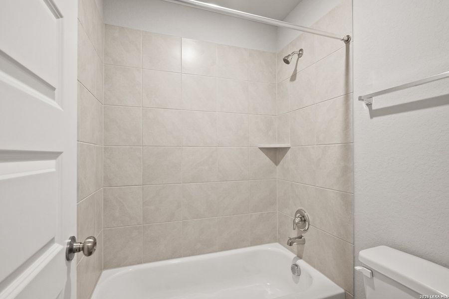 Furnished interior view inside a new home in Hickory Ridge, Elmendorf (Image 12).