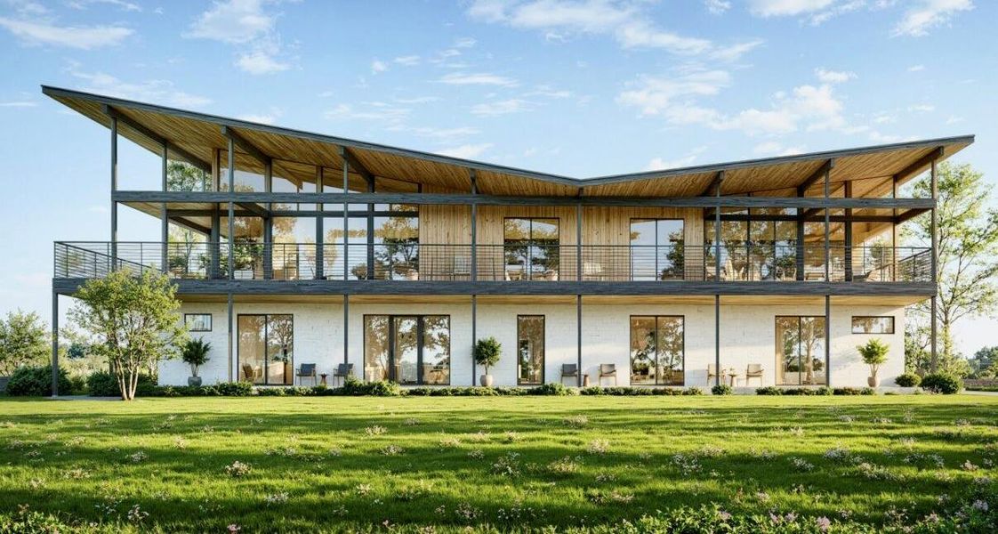 Rear view of property with a lawn, a balcony, and brick siding Rear view of property with a lawn, a balcony, and brick siding