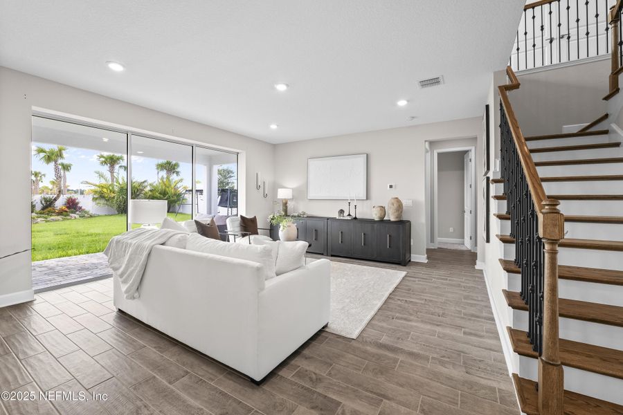 Furnished interior view inside a new home in The Cove at Beachwalk, St. Johns (Image 10). Furnished interior view inside a new home in The Cove at Beachwalk, St. Johns (Image 10).