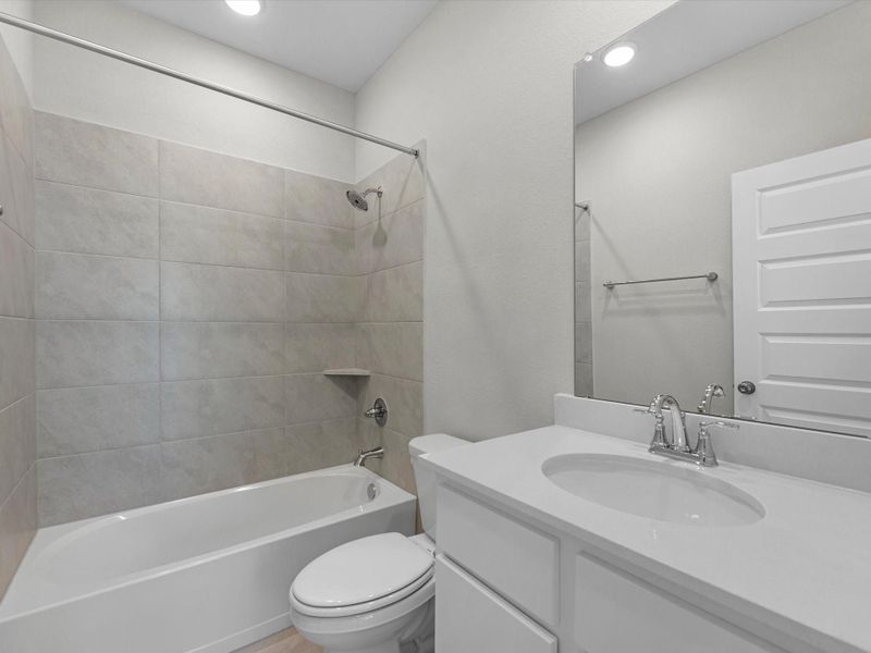 Furnished interior view inside a new home in Mason Woods, Cypress (Image 10).
