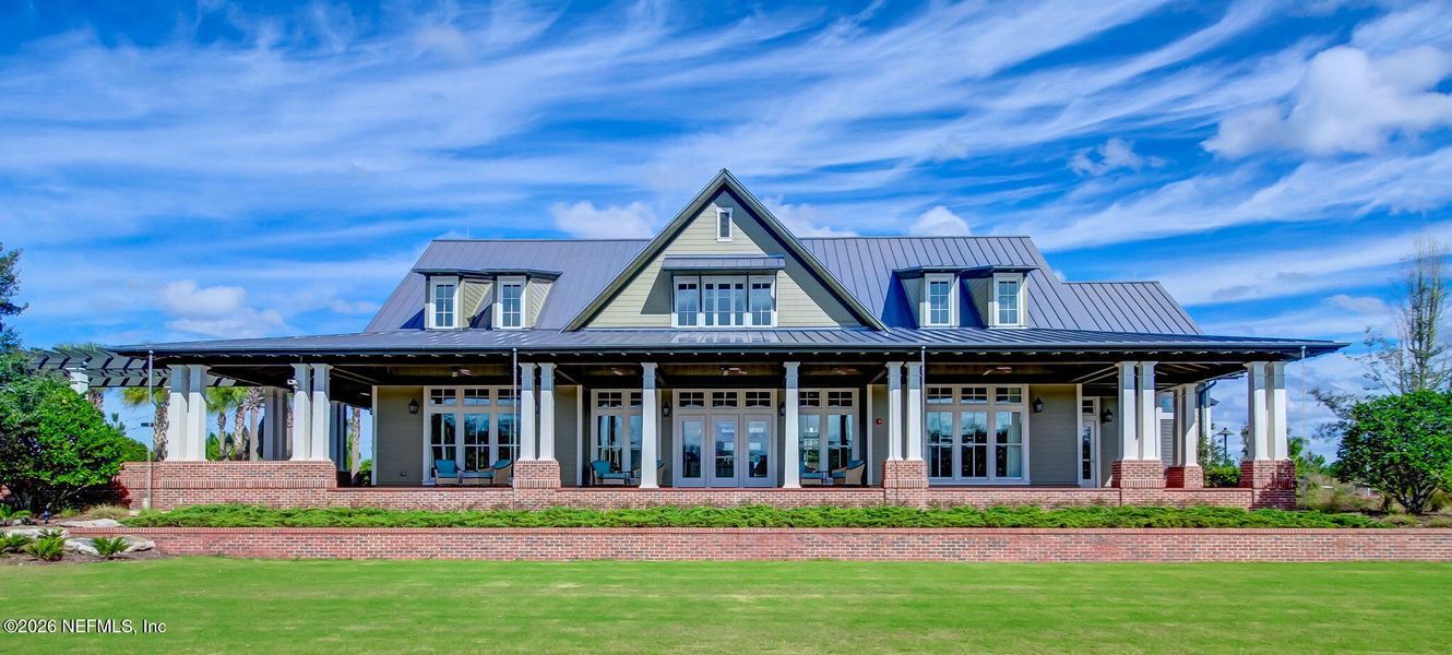 Front exterior of a new home in RiverTown, St. Johns, FL, highlighting curb appeal (Image 23).