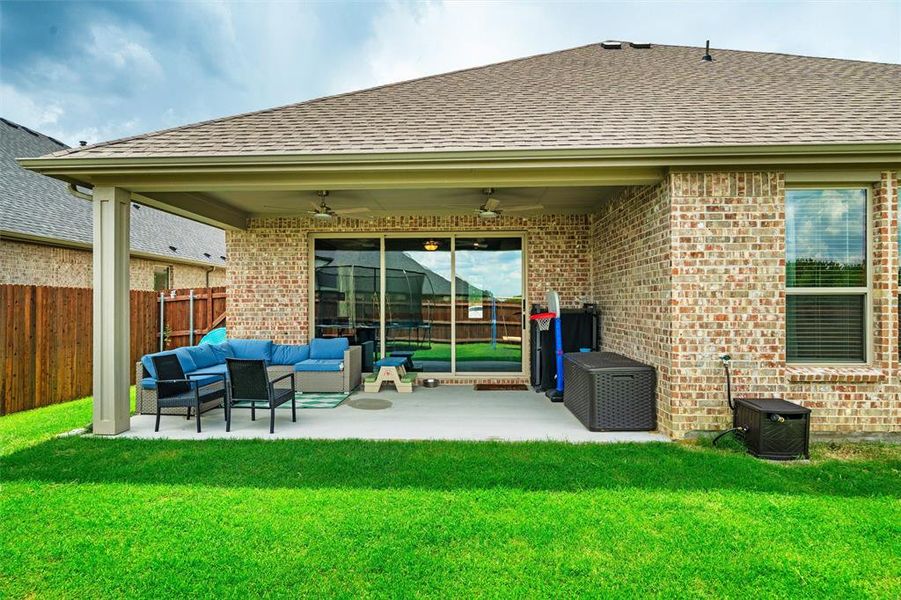 The covered patio is truly an extension of the living area--lots of room for patio furniture, a grill and a wonderful entertaining space!