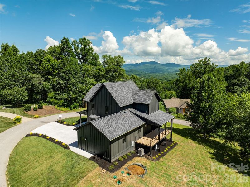 Front exterior of a new home in , Hendersonville, NC, highlighting curb appeal (Image 2). Front exterior of a new home in , Hendersonville, NC, highlighting curb appeal (Image 2).