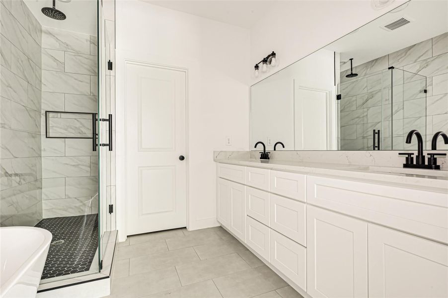 Additional view showcasing vanity, shower, and contemporary details. Additional view showcasing vanity, shower, and contemporary details.