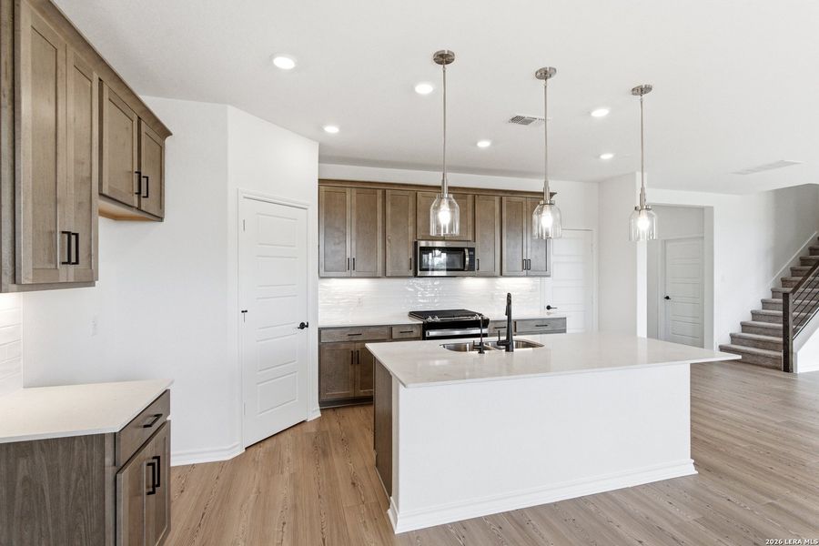 Furnished interior view inside a new home in Nopal Valley, San Antonio (Image 17).