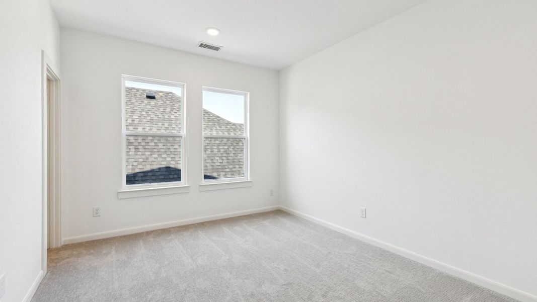 Representative unfurnished interior of a home built from the Tristan by Normandy Homes in Rainwater Crossing, Celina (Image 12).