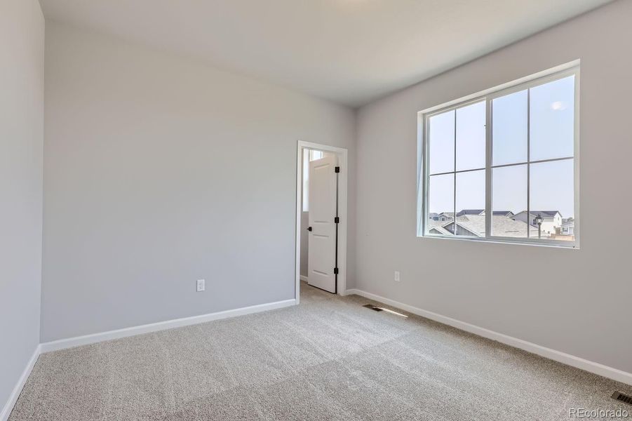 bedroom 3 with walk in closet