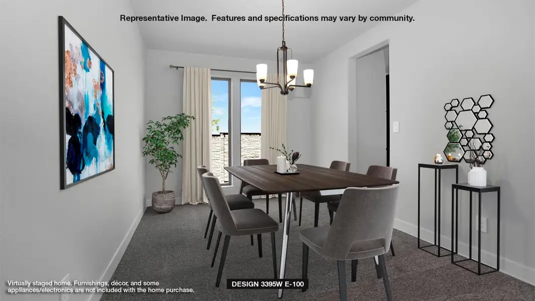 Carpeted dining space with a chandelier and baseboards
