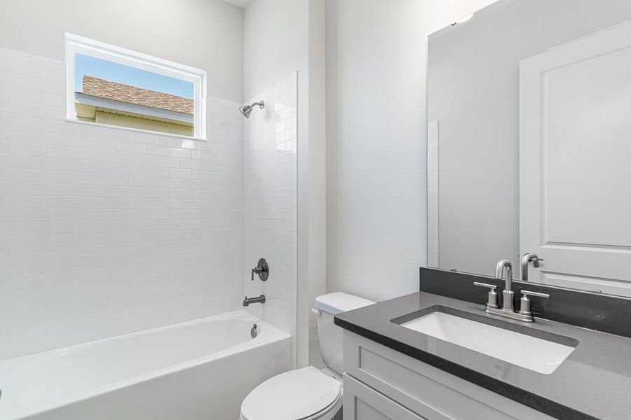 Representative furnished interior of a home built from the Letizia by Taylor Morrison in Esplanade at Center Lake Ranch, St. Cloud (Image 10).