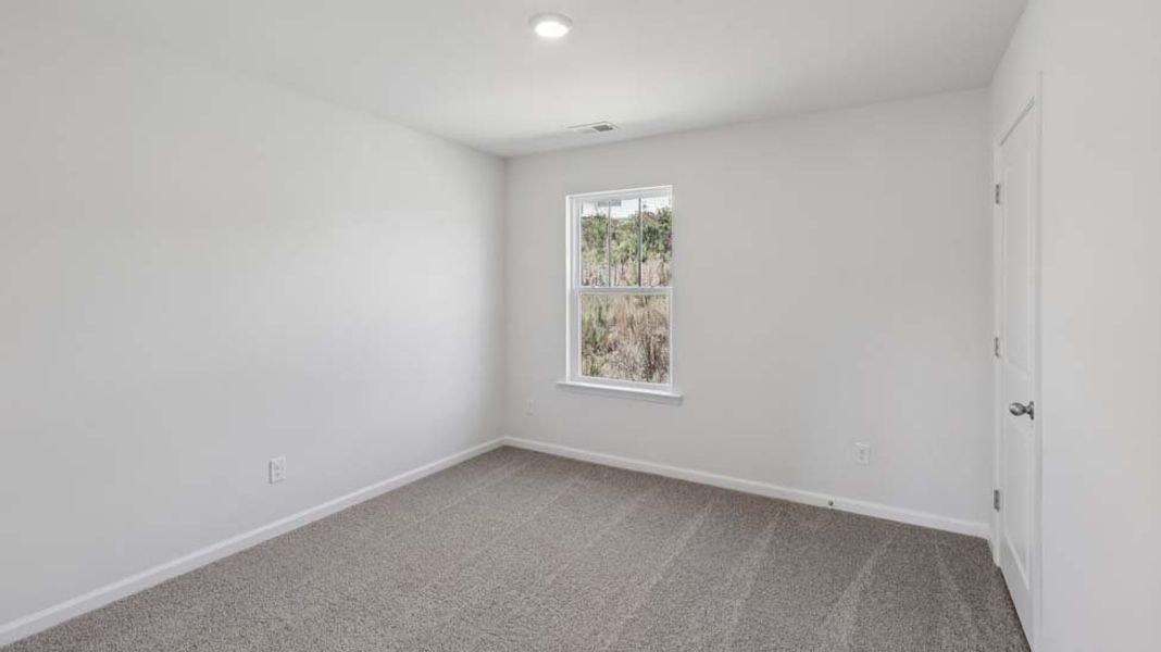 Spacious, unfurnished interior of a new home in Rydele Heights, Asheville (Image 35).