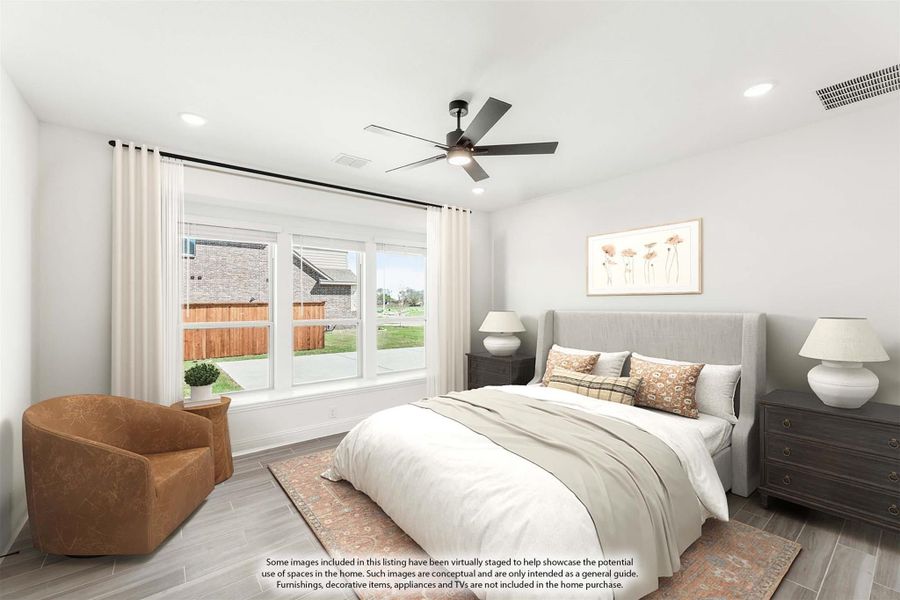 Bedroom with queen bed, ceiling fan, large window, and wood-look floors with neutral decor Bedroom with queen bed, ceiling fan, large window, and wood-look floors with neutral decor