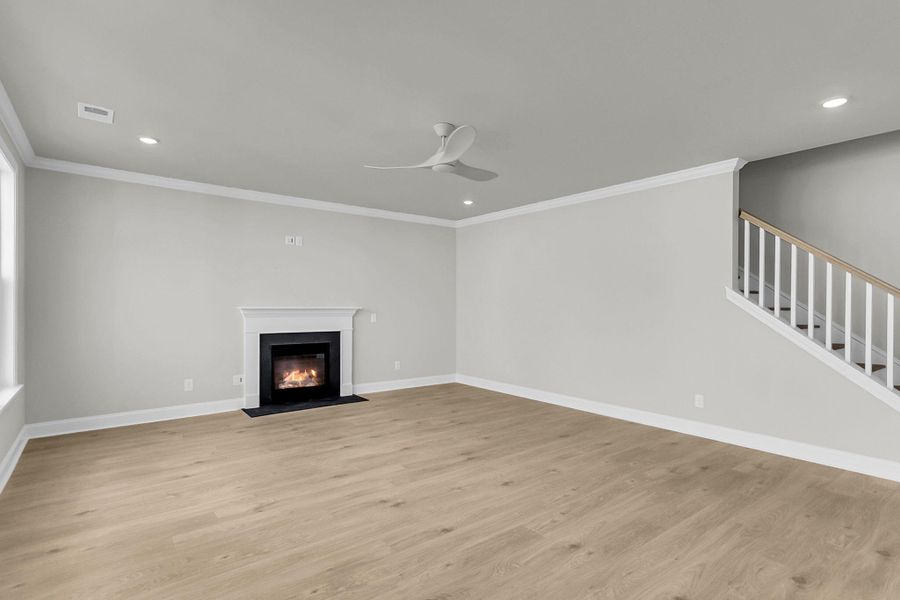 Spacious, unfurnished interior of a new home in Tidewater at Lakes of Cane Bay, Summerville (Image 40).