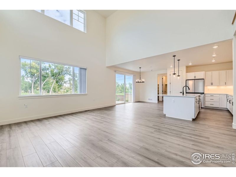 Open main floor living concept with views of the golf course and Flatirons from the great room.