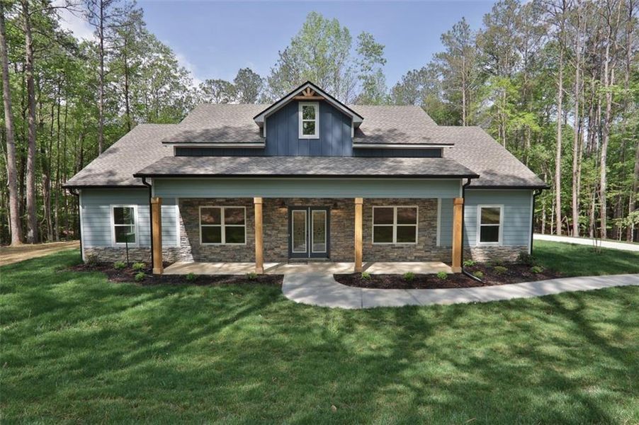 Front exterior of a new home in , Dallas, GA, highlighting curb appeal (Image 2). Front exterior of a new home in , Dallas, GA, highlighting curb appeal (Image 2).