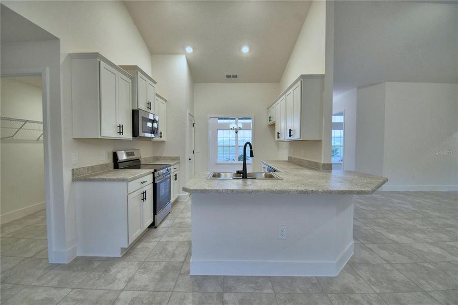 Furnished interior view inside a new home in Cadence Crossing, Auburndale (Image 4). Furnished interior view inside a new home in Cadence Crossing, Auburndale (Image 4).