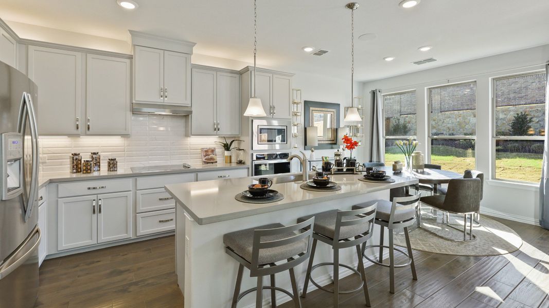 Representative furnished interior of a home built from the Hickory by Brightland Homes in Sunterra, Katy (Image 5).