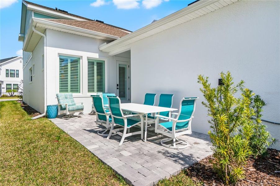 Exterior details and patio area of a home in Emerald Landing at Waterside at Lakewood Ranch – Cottage Series, Sarasota (Image 31). Exterior details and patio area of a home in Emerald Landing at Waterside at Lakewood Ranch – Cottage Series, Sarasota (Image 31).