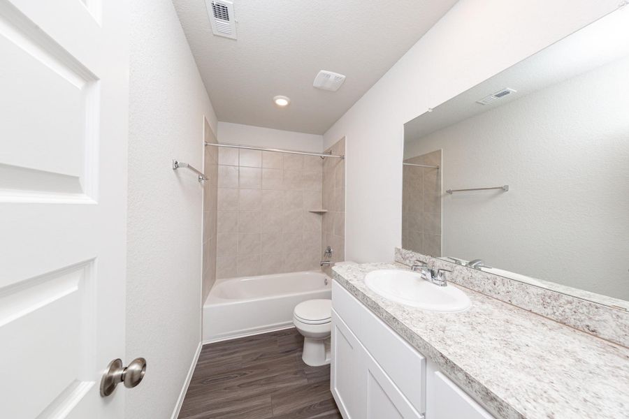 Furnished interior view inside a new home in Townsend Reserve, Splendora (Image 7).