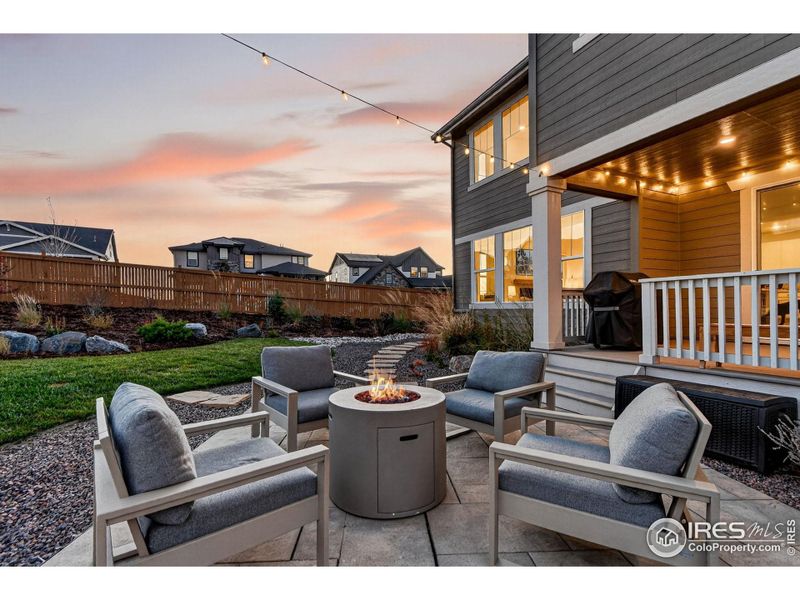 Outdoor seating area ready for casual dinners or quiet moments outside.