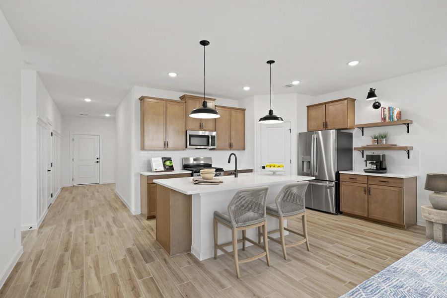 Stylish island kitchen (*Photo not of actual home and used for illustration purposes only.)