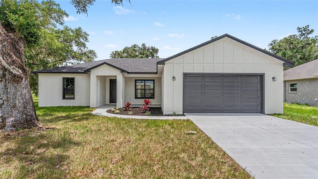 Front exterior of a new home in , Bartow, FL, highlighting curb appeal (Image 27). Front exterior of a new home in , Bartow, FL, highlighting curb appeal (Image 27).
