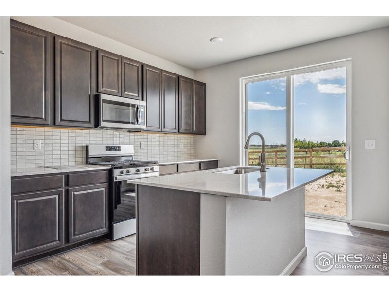 Furnished interior view inside a new home in Prairie Song, Windsor (Image 9).