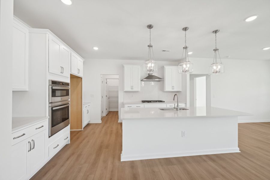 Representative furnished interior of a home built from the Jordan by Ashton Woods in Rowland's Grant, Fuquay Varina (Image 10).
