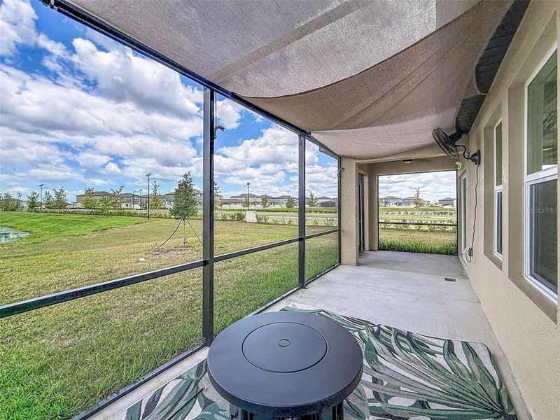 Exterior details and patio area of a home in Prosperity Lakes, Parrish (Image 3).