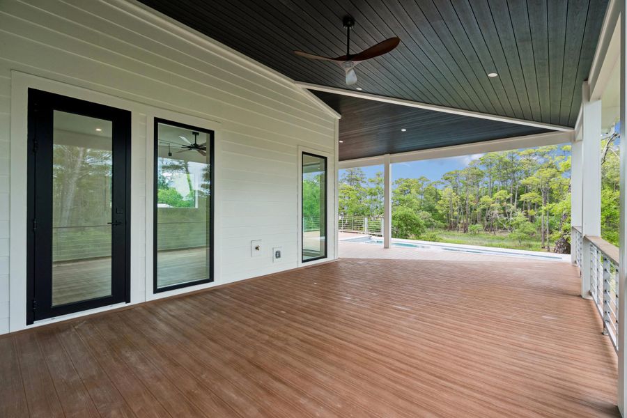 Exterior details and patio area of a home in , Folly Beach (Image 33).