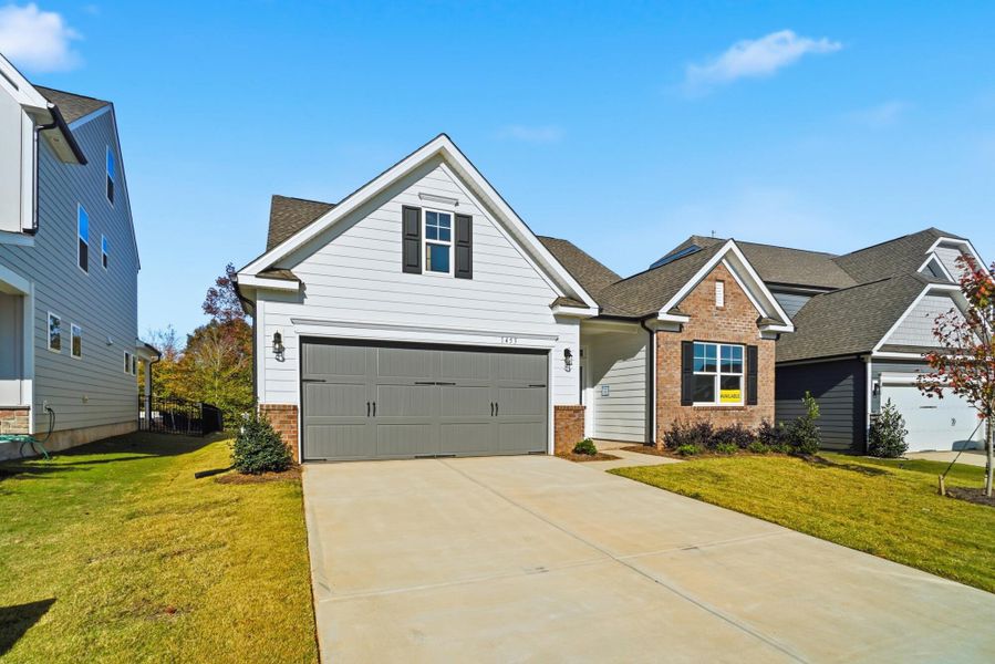 Front exterior of a new home in The Meadows at Laurelbrook, Sherrills Ford, NC, highlighting curb appeal (Image 2).