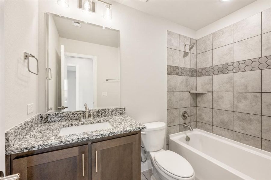 Furnished interior view inside a new home in Creekview Meadows, Pilot Point (Image 12).