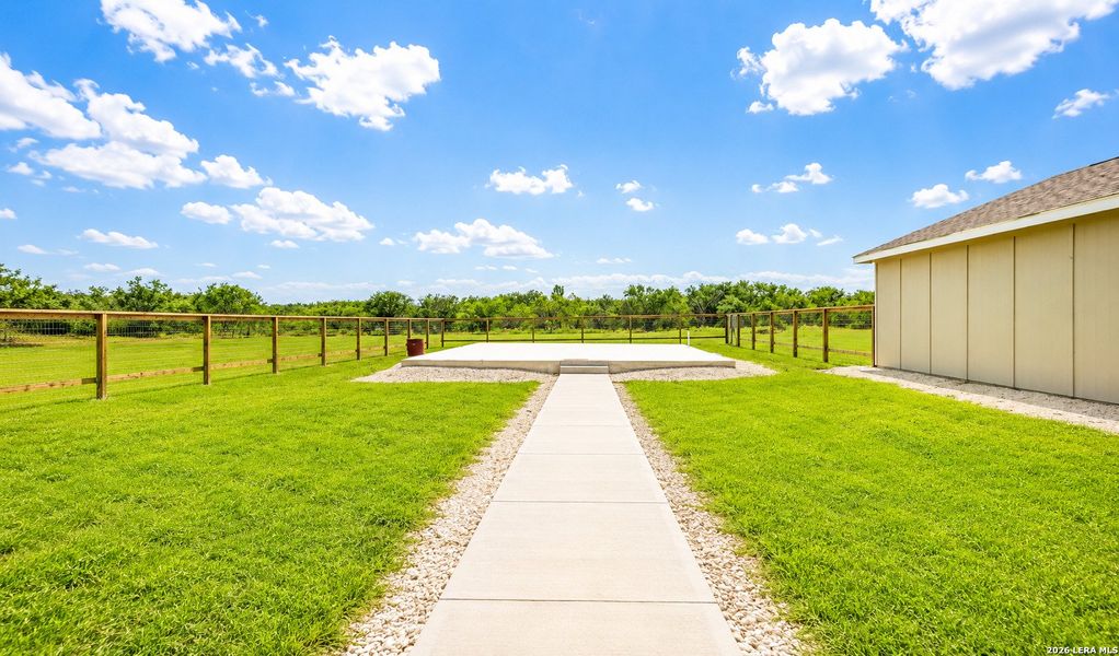 Exterior details and patio area of a home in , Devine (Image 3).