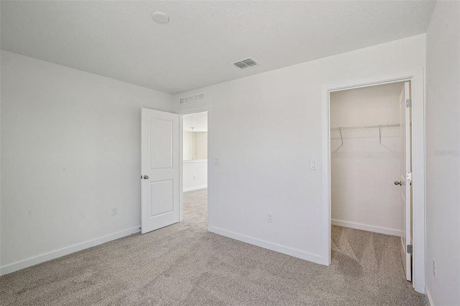 Spacious, unfurnished interior of a new home in Willowbrook North, Winter Haven (Image 32).