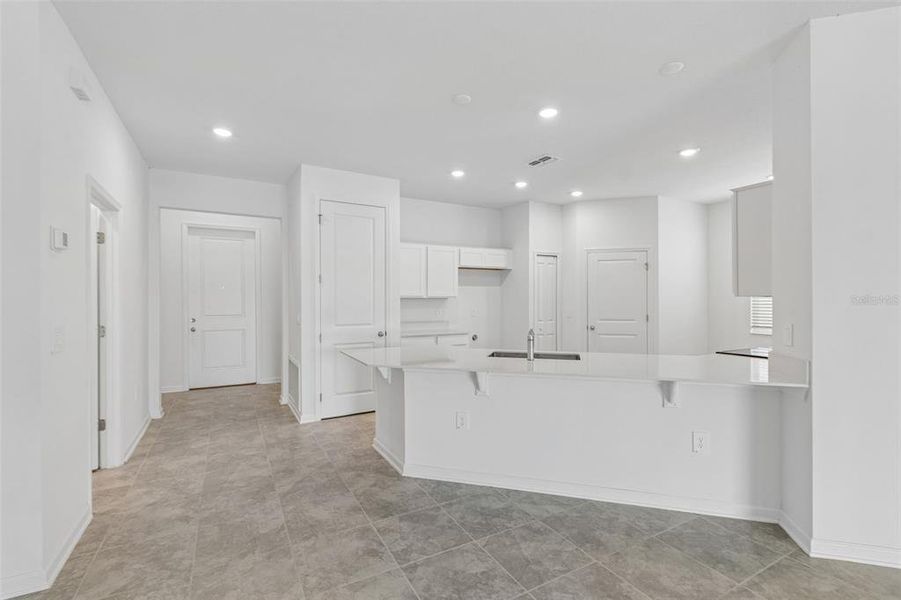 Furnished interior view inside a new home in Peace Creek Reserve, Winter Haven (Image 27).