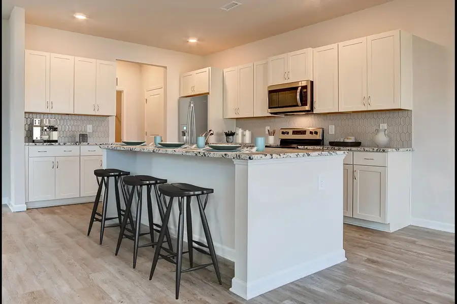 Representative furnished interior of a home built from the Bowen by McKee Homes in Pembroke, Hope Mills (Image 4).