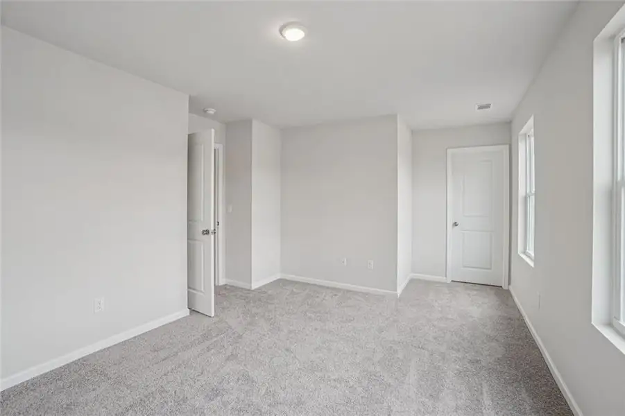 Spacious, unfurnished interior of a new home in Liberty Pointe, Villa Rica (Image 24).