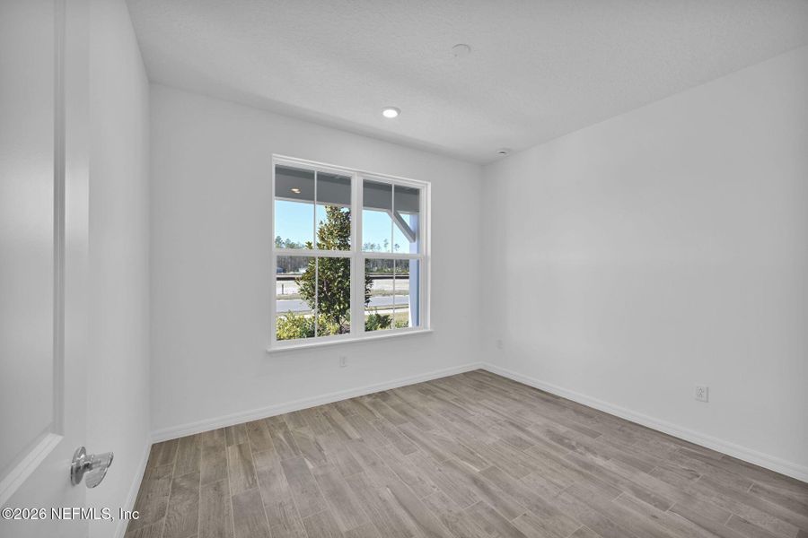 Spacious, unfurnished interior of a new home in Del Webb Wildlight, Yulee (Image 20).