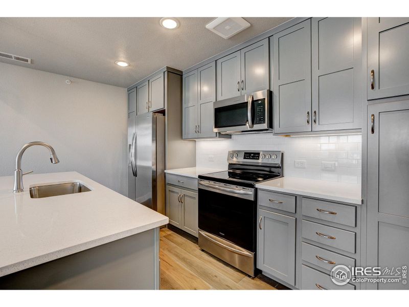 Furnished interior view inside a new home in Highlands at Fox Hill - The Flats, Longmont (Image 7). Furnished interior view inside a new home in Highlands at Fox Hill - The Flats, Longmont (Image 7).