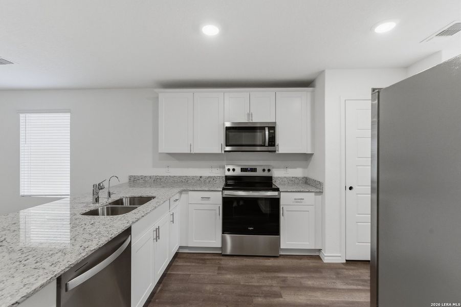 Furnished interior view inside a new home in Vista Real, Converse (Image 9).