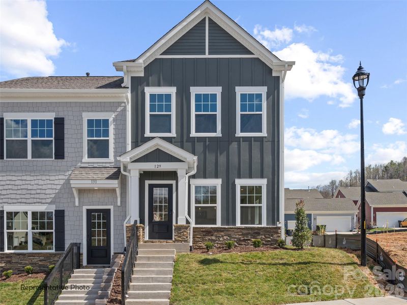 Front exterior of a new home in , Asheville, NC, highlighting curb appeal (Image 21).