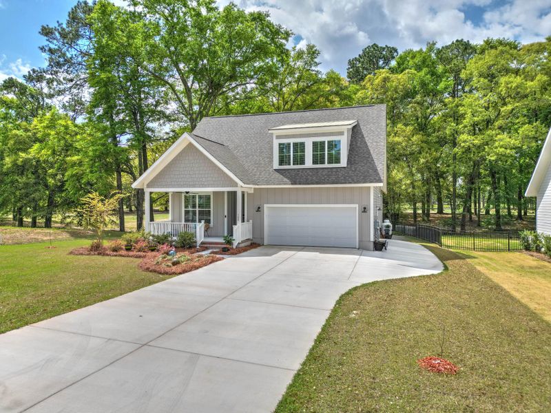 Front exterior of a new home in , Santee, SC, highlighting curb appeal (Image 26).