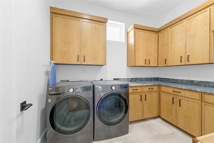 1 of 2 utility areas with washer/dryers 1 of 2 utility areas with washer/dryers