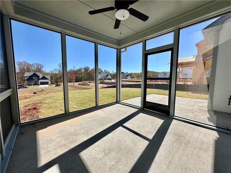 Exterior details and patio area of a home in Twin Lakes, Hoschton (Image 1).