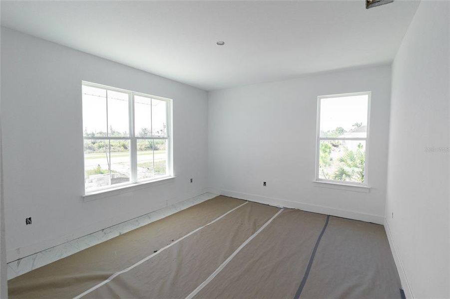 Spacious, unfurnished interior of a new home in , Port Charlotte (Image 19).