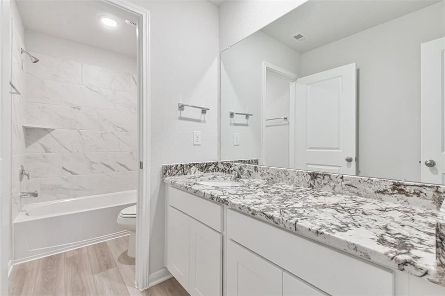 Furnished interior view inside a new home in Lakes at Black Oak, Magnolia (Image 60).