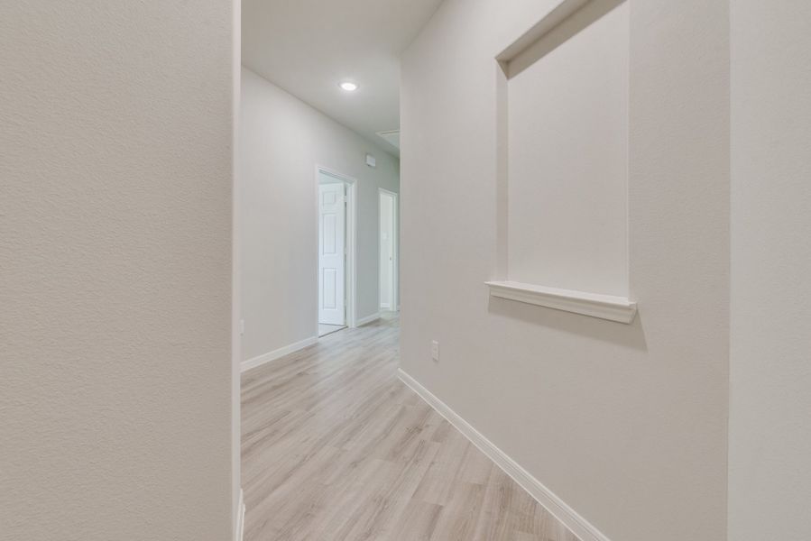 Representative unfurnished interior of a home built from the Floor Plan 1784 by Colina Homes in River Ranch, Dayton (Image 22).