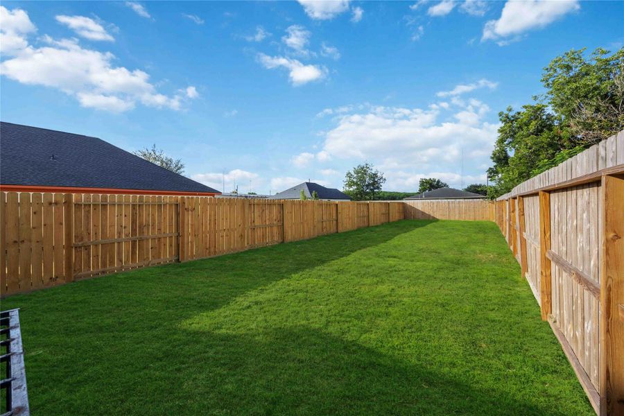 Exterior details and patio area of a home in , Houston (Image 3).