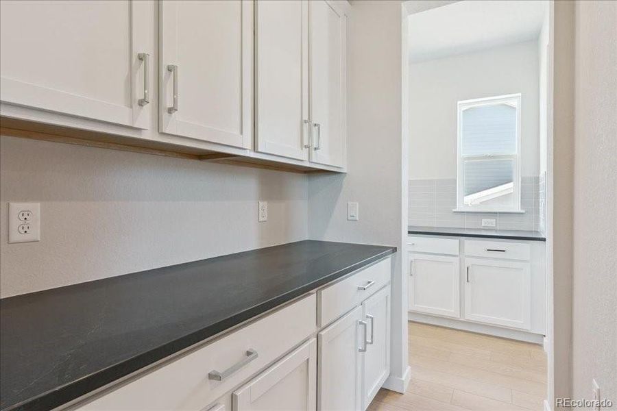 Furnished interior view inside a new home in Trails at Smoky Hill, Parker (Image 10).