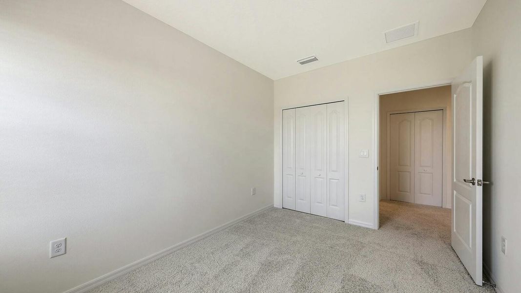Spacious, unfurnished interior of a new home in Palm Grove Real Estate and Homes for Sale in Lakewood Ranch, FL - Neal Communities, Lakewood Ranch (Image 71).